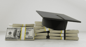 Graduation cap with US dollars